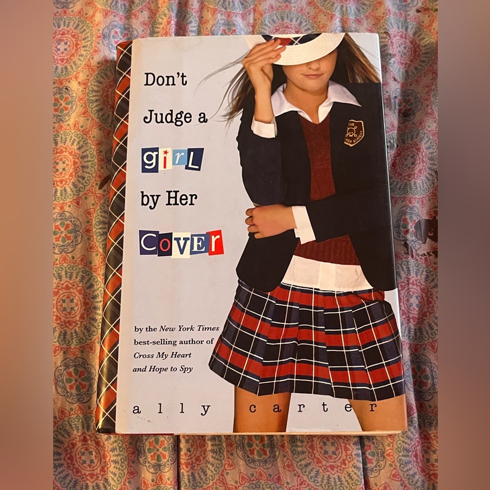 Don’t judge a girl by her cover  by Ally Carter